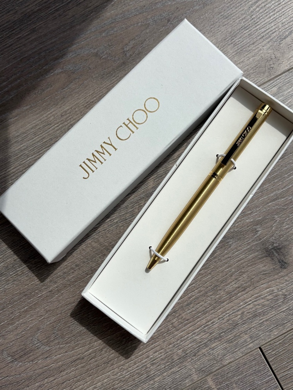 Jimmy Choi gold ballpoint pen